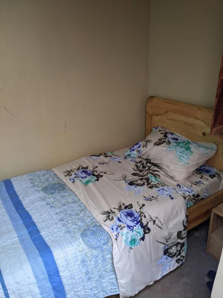 G Masters Homes Kigali Quarto foto