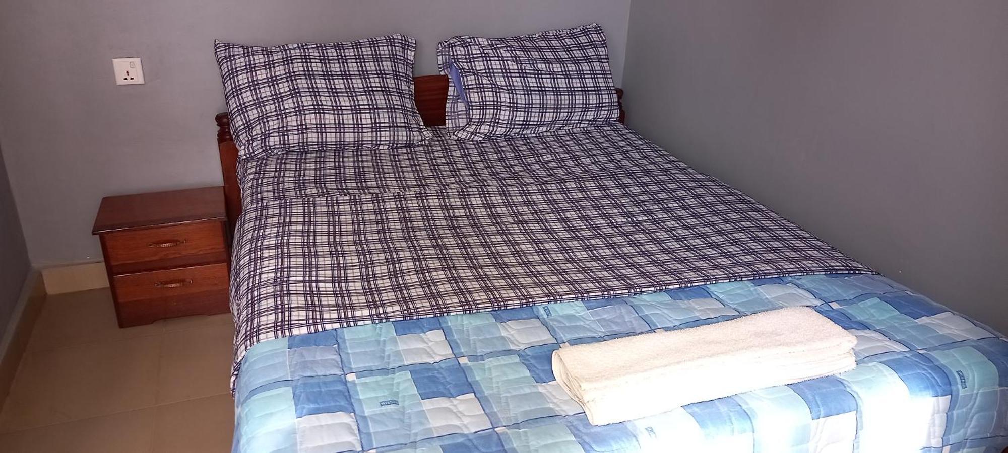 G Masters Homes Kigali Quarto foto